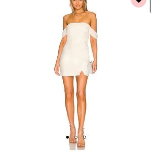 Likely “Paz Dress” white mini off-shoulder dress, size 2, orig$228 on Revolve